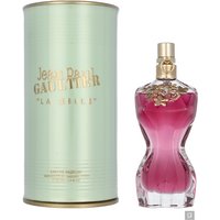 Gold-capped, curvy pink perfume bottle beside a mint green cylindrical box with gold lettering.