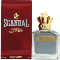 Clear glass bottle with gold crown cap, red box labeled "Scandal" by Jean Paul Gaultier, 150ml Eau De Toilette.