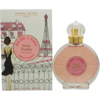 Round pink perfume bottle with gold cap, Eiffel Tower-themed box, "Jeanne Arthes Balade A Paris Soiree Rooftop" label.