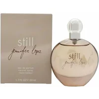 Round glass bottle of Jennifer Lopez Still Eau De Parfum 50ml with a clear cap and beige box.