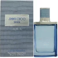 Jimmy Choo Man Aqua Eau De Toilette 50ml, blue glass bottle with silver cap, next to textured blue box.