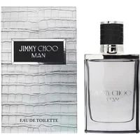 Clear glass bottle with black cap, silver accents, next to textured silver box labeled "Jimmy Choo Man Eau De Toilette."