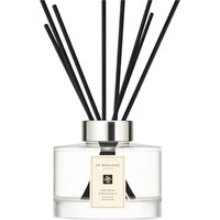 Jo Malone citrus diffuser with clear glass bottle, silver cap, and black reeds, labeled Lime Basil & Mandarin, 165 ml.