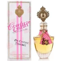 Juicy Couture Couture Eau De Parfum 100ml with ornate gold cap, pink ribbon, and decorative box.