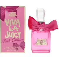 Pink Juicy Couture perfume bottle with gold emblem, topped with a pink bow, next to matching pink and gold box.