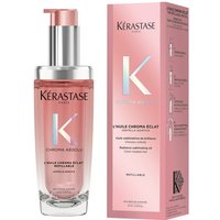 Pink Kérastase Chroma Absolu Hair Oil bottle with silver pump and matching pink box displaying product details.