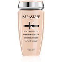 Peach Kérastase Curl Manifesto shampoo bottle with silver cap and black text, 250ml size.