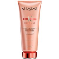 Peach-colored Kérastase Discipline Fondant Fluidealiste 200ml tube with silver cap and red accents.
