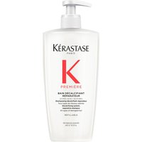 Kérastase Première Shampoo in a clear refillable bottle with pump, featuring a bold red "K" and black text on the label.