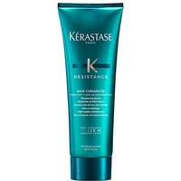 Teal Kérastase Resistance Bain Thérapiste shampoo tube with silver cap and white text, 250ml size.
