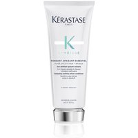 White Kérastase Symbiose conditioner tube with teal accents and black text, 200ml size.