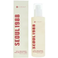 K-Secret SEOUL 1988 Essence, translucent bottle with pump, snail mucin 97% and rice, next to matching box.