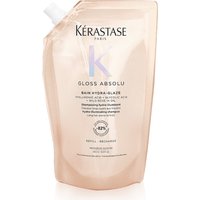 Peach-colored Kerastase Gloss Absolu Refill Pouch Shampoo 500ml with a spout and minimalist design.