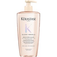 Clear bottle of Kérastase Gloss Absolu Refillable Shampoo 500ml with pump dispenser and pastel label design.