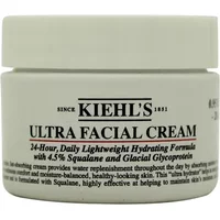 White Kiehl's Ultra Facial Cream jar, 28ml, with black text and logo, featuring hydrating formula details on the label.
