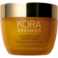 Amber jar of Kora Organics Turmeric Glow Moisturizer with gold lid and white text on the front.