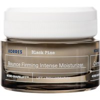 Korres Black Pine moisturizer in a clear jar with white lid, featuring bold black and white text on the label.