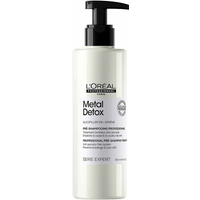 L'Oréal Professionnel Metal Detox Anti-Porosity Filler Pre-Shampoo in white pump bottle with black cap.