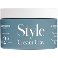 Blue La Biosthetique Cream Clay jar with white lid, bold "Style" text, 2.5 hold rating, 75ml capacity.