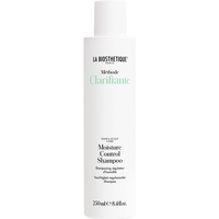 White cylindrical bottle of La Biosthetique Moisture Control Shampoo, 250ml, with black text and green accents.