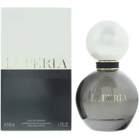 Gray spherical La Perla Signature Eau De Parfum 50ml bottle with pearl-like cap, next to matching box.