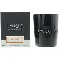 Lalique Safran Mashhad Iran Candle 190g, black glass holder, white text, next to matching black box with orange label.