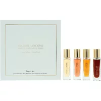 Lancôme Grands Crus Gift Set with four eau de parfum bottles in gold-capped glass, next to a white box.