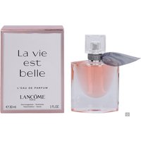 Clear glass bottle of Lancôme La Vie Est Belle Eau de Parfum with pink liquid, silver cap, and gray ribbon, next to box.