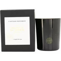 Black L'Artisan Parfumeur candle with gold logo, next to a matching black box labeled "Souffle De Jasmin" in white text.