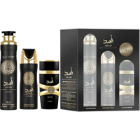 "Lattafa Asad 3-piece gift set with black and gold bottles, ornate design, in a sleek black box with clear window"