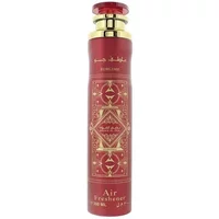 Red Lattafa Bade'e Al Oud Sublime room spray, 300ml, with gold ornate design and Arabic script.