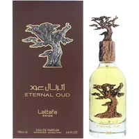 Lattafa Eternal Oud Eau De Parfum 100ml with tree-shaped cap and brown box featuring tree design.