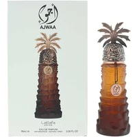 Lattafa Pride Ajwaa Eau De Parfum 90ml, amber bottle with palm tree cap, ornate silver detailing.