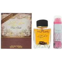 Lattafa Pure Oudi gift set with ornate box, amber perfume bottle, and pink rose-patterned deodorant spray.