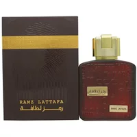 Lattafa Ramz Lattafa Gold Eau De Parfum 100ml, brown bottle with gold cap, matching brown and gold box.