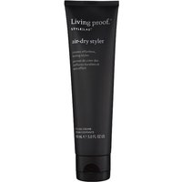 Black tube of Living Proof Air-Dry Styler, 148ml, with white text and flip-top cap.