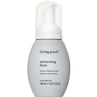 Gray bottle of Living Proof Full Texturizing Foam 148ml with white pump and black text detailing.
