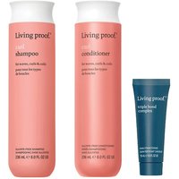 Living Proof Curl Shampoo and Conditioner in pink bottles, 236ml each, with a small blue Triple Bond Complex tube.