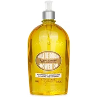 L'Occitane Almond Shower Oil 500ml in clear bottle with pump, golden liquid, oval label with white and brown text.