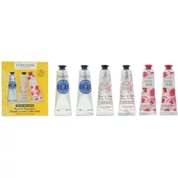 L'Occitane hand cream set, six 30ml tubes with floral designs, includes yellow box packaging.