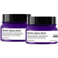 Purple L'Oréal Professionnel Keratin Alpha Sleek Hair Mask jars with white labels and black lids.