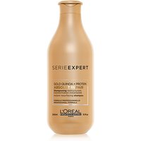 Gold bottle of L'Oréal Professionnel Serie Expert Absolut Repair Shampoo, 300ml, with black and white text.