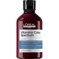 L'Oréal Professionnel Vitamino Color Spectrum blue tinted shampoo in a dark red bottle with a black cap.