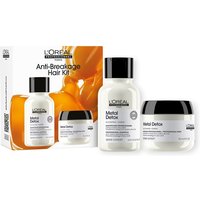 L'Oreal Metal Detox Anti-breakage mini shampoo and hair mask in white bottles with black lids, boxed set.