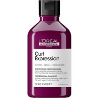 L'Oreal Professionnel Curl Expression shampoo in a purple bottle with a black cap and white label.