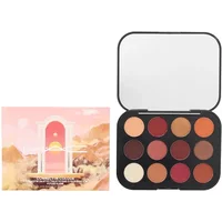 MAC Connect In Colour Eyeshadow Palette with 12 warm shades, including reds and browns, in a black compact case.