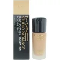 MAC Studio Radiance Foundation N18, beige liquid in clear bottle with black cap, next to black and gold box.
