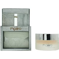 Maiiro Anti-Blemish Cream 50ml in a round jar with silver lid, next to a textured gray box with gold branding.