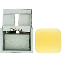 Maiiro Organic Soap 125g, pale yellow rectangular bar with embossed logo, beside silver packaging.