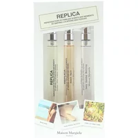 Maison Margiela Replica set with three 10ml clear spray bottles, labeled Beach Walk, Lazy Sunday Morning, Under The Lemon Tree.